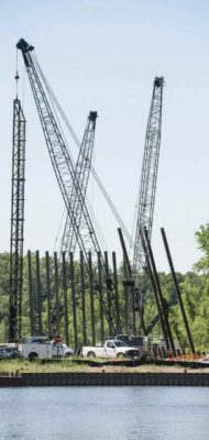 Piles driving equipment for soil stabilization on a construction site used for environmental testing and consulting