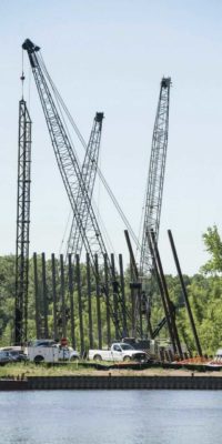 Piles driving equipment for soil stabilization on a construction site used for environmental testing and consulting