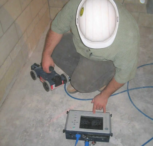 employee using ground penetrating radar equipment
